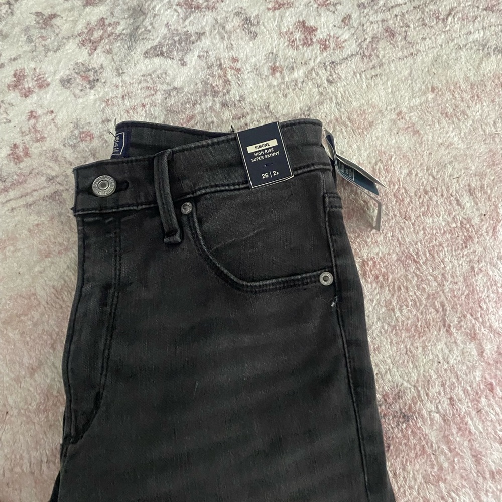 Black ripped skinny jeans